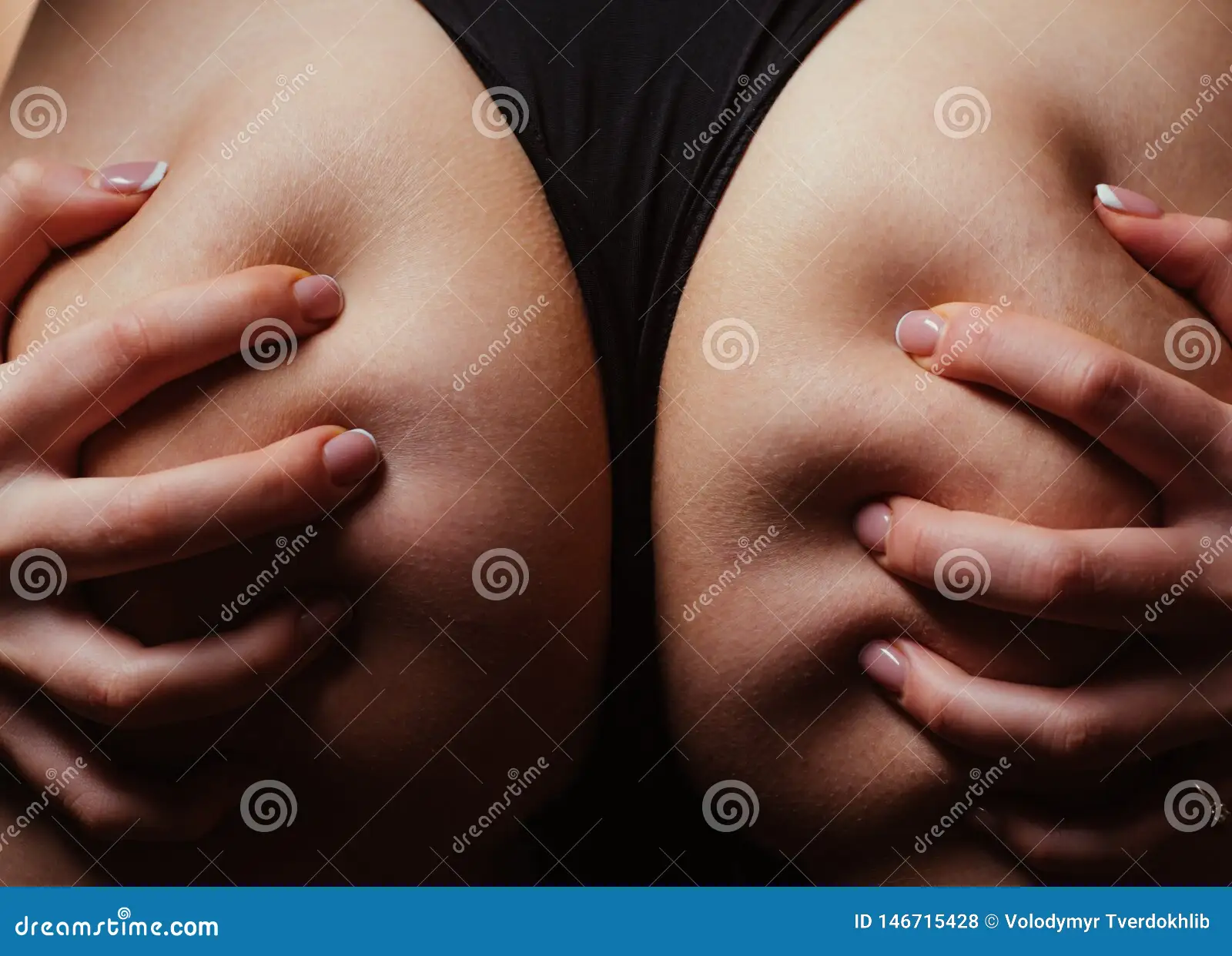 Lesbian Sex. Female in Bikini Close Up. Lingerie Model. in Female Hands Stock Photo