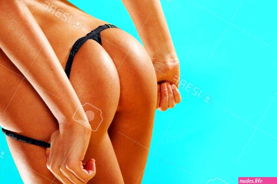 Tanned Mooie Sexy Kale Vrouwelijke Billen In Een G-string Close-up Uitzicht Geïsoleerd Op Een Turquoise Achtergrond Met Copyspace Royalty-Vrije Foto Plaatjes Beelden en Stock Fotografie. Image 21338422