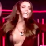 Models boobs burst out of her tiny dress during live Big Brother eviction