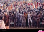 Procession of naked pilgrims going for a holy bath in Ganges River during Khumb Mela Festival 2001 Allahabad. Uttar Pradesh Stock Photo