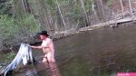 Naked bathing in the river.