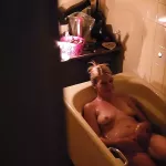 Peeping Through My Neighbours Bathroom Window Watch how She Plays with Her Pussy