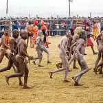 Naked Hindu Devotees Running towards the Ganges River