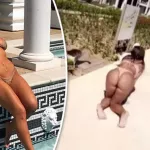 Singer flashes INCREDIBLE booty at beach zoo