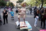 Clown behind naked Hillary statue is a disingenuous Trump fan