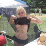 File:Woman flashing breasts.jpg