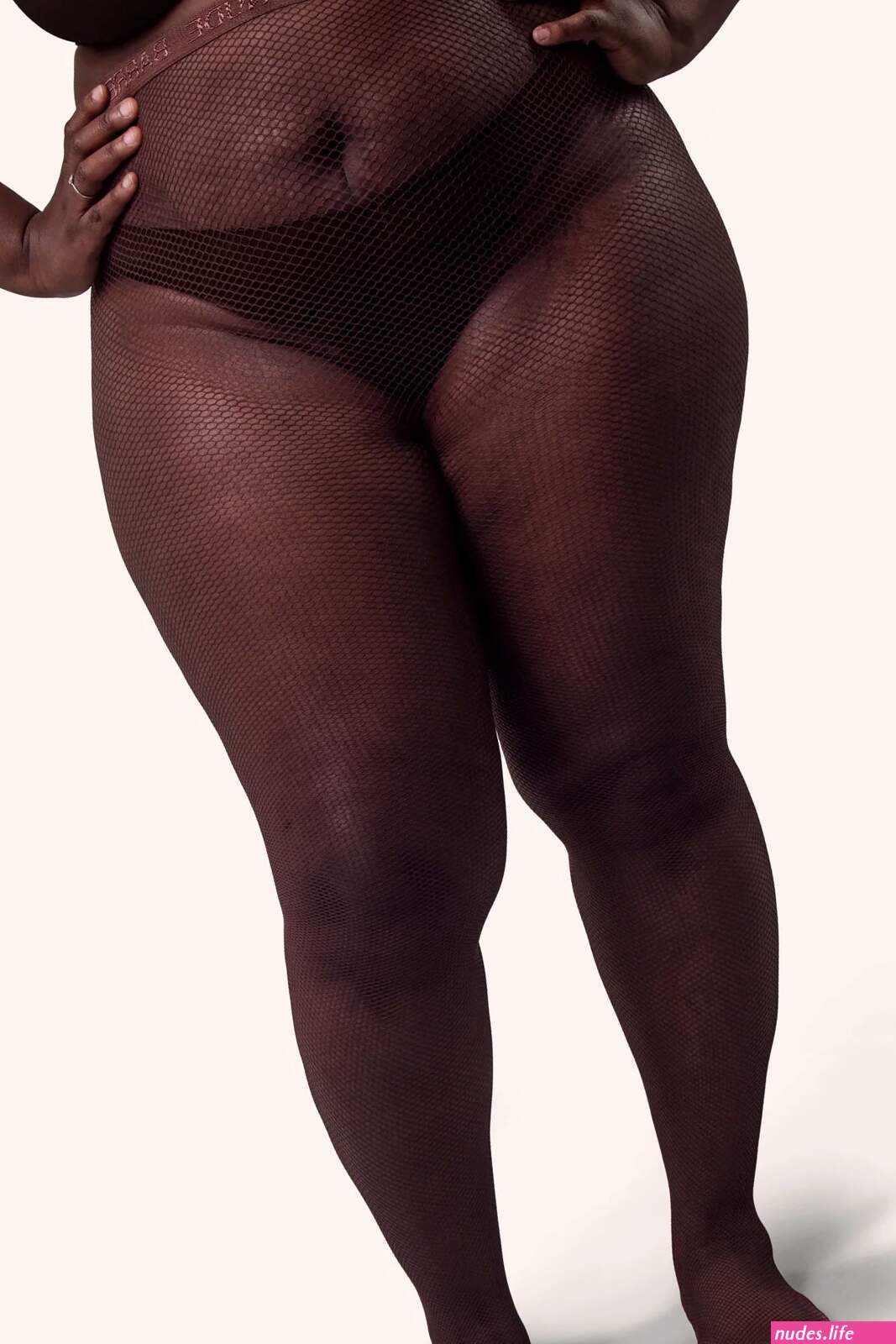 Nude in fishnets